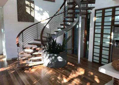 timber floor and handrail spiral staircase